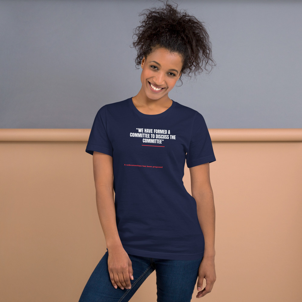 WE HAVE FORMED A COMMITTEE TO DISCUSS THE COMMITTEE — printed on a navy t-shirt